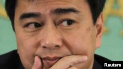 Former Thai Prime Minister Abhisit Vejjajiva attends a news conference at the Japan National Press Club in Tokyo, March 2, 2012.