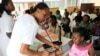 Une infirmière en consultation, au Nigeria, le 24 mars 2011.