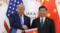 2019年6月29日，時任美國總統特朗普與中國國家主席習近平在大坂舉行的G20峰會上握手。