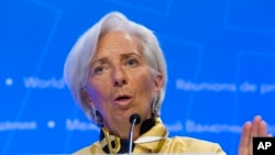 La Directrice générale du Fonds monétaire international (FMI), Christine Lagarde, lors d'une conférence de presse lors des réunions de printemps de la Banque mondiale et du FMI à Washington, jeudi 19 avril 2018.
