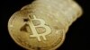 Rupa mata uang kripto Bitcoin terlihat pada gambar ilustrasi yang diambil 7 Juni 2021. Majelis Ulama Indonesia menyatakan bahwa Bitcoin dan mata uang kripto lainnya dilarang berdasarkan hukum Islam dan tidak boleh diperdagangkan di Tanah Air. (Foto: REUTERS/Edgar Su)