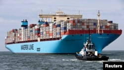 The VN Maersk Mc-Kinney Moller នាវា​ដឹក​ជញ្ជូន​ដ៏​បំផុត​ក្នុង​លោក​ ទៅ​ដល់​កំពង់​ផែ​ Totterdam កាលពី​ថ្ងៃទី១៦ ខែសីហា ឆ្នាំ២០១៣។ 
