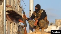 Un combattant de l'ex-Front Al Nosra (maintenant Fateh al-Cham) , province d'Idleb, le 29 mai 2015.