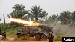 ARCHIVES - Une offensive des Forces armées de la RDC contre les rebelles ougandais des près de Beni, iNord-Kivu le 18 janvier 2014.