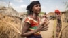 In this photo taken Jan. 26, 2016, Mayrem Humeyisu talks about food supply in her neighborhood in a rural village Dubti Woreda, Afar, Ethiopia. 