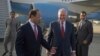 U.S. Secretary of State Rex Tillerson chats with Pakistani foreign office official, Sajid Bilal, as he arrives to the Nur Khan military airbase in Islamabad, Pakistan, Oct. 24, 2017. 