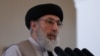FILE - Afghan warlord Gulbuddin Hekmatyar speaks during a welcoming ceremony at the presidential palace in Kabul, Afghanistan, May 4, 2017. 