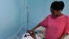 Ester Terry tare da Khalifa a asibiti catania a kasar Italiya