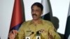 FILE - Pakistani military spokesman Major General Asif Ghafoor speaks to reporters in Rawalpindi, Pakistan, April 17, 2017. He said Oct. 14, 2017, that the rescue of a U.S.-Canadian family from Taliban activity offered a good opening in restoring mutual trust between Pakistan and the U.S.