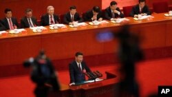 中共總書記習近平在北京人大會堂召開的中共19大開幕式上發表講話。 （2017年10月18日）