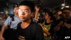 被中國媒體稱為“港獨”頭目之一的香港90後青年黃之鋒參加7月7日反送中游行現場。 (2019年7月7日)