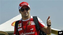 Ferrari Formula One driver Felipe Massa, of Brazil, gives the thumb-up at the Interlagos racing track, in Sao Paulo, Brazil, 04 Nov 2010. The Brazilian Formula One Grand Prix will be held 07 Nov 2010 in Sao Paulo.