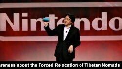 E3 Nintendo
Saturo Iwata, Président de Nintendo Co. Ltd, annonce officiellement la Nintendo 3DS, la première portable système de jeu en 3D, lors de l'E3 la présentation de Nitendo au Nokia Theatre LA LIVE, mardi 15 Juin 2010, à Los Angeles.
