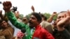 Supporters of the opposition parties celebrate the dismissal of Pakistani Prime Minister Nawaz Sharif outside the Supreme Court in Islamabad, Pakistan, July 28, 2017. 