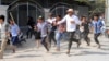 Labor Demonstrators Injured in Clash With Elite Military Unit