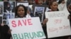 FILE - Burundi nationals from across the U.S. and Canada, along with supporters, demonstrate outside U.N. headquarters, calling for an end to political atrocities and human rights violations unfolding in Burundi under the government of President Pierre Nkurunziza on April 26, 2016, in New York. 
