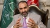 FILE - Atta Mohammad Noor, governor of the Balkh province, talks during an interview with The Associated Press at his home in Kabul, Afghanistan, Aug. 3, 2015. 