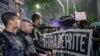 People protest to demand an end to police violence against Black and poor people in Sao Paulo, Dec. 5, 2024. On Saturday, a judge sentenced three former officers of Brazil's Federal Highway Police over the death of a Black man killed by asphyxiation inside an SUV's trunk.
