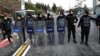 Turkish police stand guard on a road leading to the Reina nightclub by the Bosphorus, which was attacked by a gunman, in Istanbul, Jan. 1, 2017. 