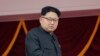 FILE - North Korea's leader Kim Jong Un watches a parade in Pyongyang, May 10, 2016. 