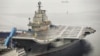 中国第一艘航母辽宁号9月22日停泊在大连港