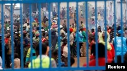 Des personnes ayant fui la République démocratique du Congo sont rassemblées au camp de réfugiés de Kyangwali, géré par le HCR, à Kyangwali, en Ouganda, le 19 mars 2018. (Photo Reuters)