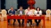 U.N. Security Council President Gustavo Meza-Cuadra, center left, Permanent Representative of Poland to United Nations Joanna Wronecka, center right, Permanent Representative of the State of Kuwait to the United Nations Mansour Ayyad al-Otaibi, left, and 