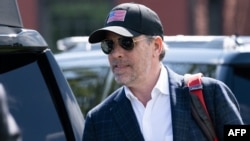 (FILES) (FILES) Hunter Biden walks to a waiting SUV after arriving with US President Joe Biden on Marine One at Fort McNair in Washington, DC, on July 4, 2023.