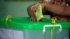 A voter cast her ballot for the by-election in Yangon, Myanmar, November 3, 2018. REUTERS/Ann Wang