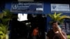 A man is on the phone in front of the office of the Cambodian League for the Promotion and Defense of Human Rights (LICADHO), in Phnom Penh, Cambodia November 24, 2017. REUTERS/Samrang Pring