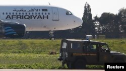 L'appareil d'Afriqiyah Airways sur le tarmac de l’aéroport de La Valette, Malte, le 23 décembre 2016