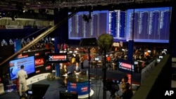 South African television channels report results as they come in from the Independent Electoral Commission Results Center in Pretoria, South Africa, May 9, 2019.