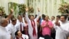A scion of Sri Lanka’s Rajapaksa family, presidential candidate Namal Rajapaksa, center, gestures as he receives ticket from the Sri Lanka Podujana Peramuna (SLPP) party in Colombo on Aug. 7, 2024.