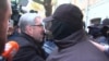 Nika Gvaramia, leader of the Coalition for Change party, is surrounded by police officers before his detention in Tbilisi, Georgia, Dec. 4, 2024, in this image taken from video. (Formula TV via Reuters)