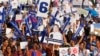 Supporters of the Palang Pracharat Party cheer during an election campaign rally ahead of Sunday's general election in Bangkok, Thailand, Friday, March 22, 2019. The nation's first general election since the military seized power in a 2014 coup is expecte