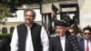 Pakistani Prime Minister Shahid Khaqan Abbasi is received by Afghan President Ashraf Ghani at the presidential place in Kabul, April 6, 2018.