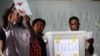 FILE - Pollling officials distinguish votes between Hutus and Tutsis in Burundi's capital, Bujumbura, July 28, 2010. 