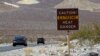 Archivo. Un señal advierte del calor extremo a los turistas que entran al parque nacional Valle Muerto en California. 29 de junio de 2013.