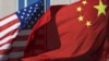 焦点对话：贸易战硝烟弥漫，美中边打边谈？