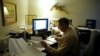 FILE - The use of modern communication technologies is rapidly transforming the traditional mode of working in a fixed location in favor of working at home. 
