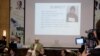 FILE - A slide showing a picture of Imran Ali, who was sentenced to death for the rape and murder of seven-year-old Zainab Ansari, is shown at a press conference in Lahore, Pakistan January 23, 2018.