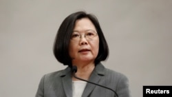 Taiwanese President Tsai Ing-wen attends a news conference to announce the new Presidential Office secretary-general in Taipei, Taiwan April 11, 2018. 