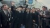 FILE - The Beatles, from left, John Lennon, Paul McCartney, Ringo Starr and George Harrison, arrive at John F. Kennedy International Airport in New York, on Feb. 7, 1964. 