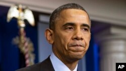 Le président Barack Obama, visiblement ému lors de son hommage au président Nelson Mandela