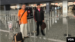 劉興聯（左）、顏伯鈞（右）於台北桃園機場（顏伯鈞推特照片）