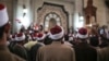 FILE - Muslim clerics are seen gathered at a mosque in central Cairo, Egypt, Feb. 3, 2015. Muslim clerics and scholars not in line with Islamic State postulates have been the latest target of IS propaganda videos.