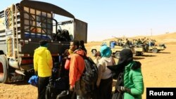 Des migrants illégaux et leurs passeurs arrêtés en route vers Libya, à Omdurman, Soudan, le 8 janvier 2017.