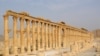 FILE - The demolition of ancient monuments like this colonnade in the historical city of Palmyra, Syria was targeted by the Islamic State group and among cultural sites destroyed in 2015. 