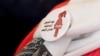 Badge affichant un symbole anti-MGF porté par une volontaire à une conférence lors de la Journée internationale de tolérance zéro pour les mutilations génitales féminines au Caire, Égypte, 6 février 2018. (REUTERS/Amr Abdallah Dalsh)
