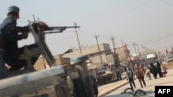 Les forces irakiennes patrouillent dans la zone de Hammam al-Alil, à environ 14 kilomètres de la périphérie sud de Mossoul, 7 novembre 2016.